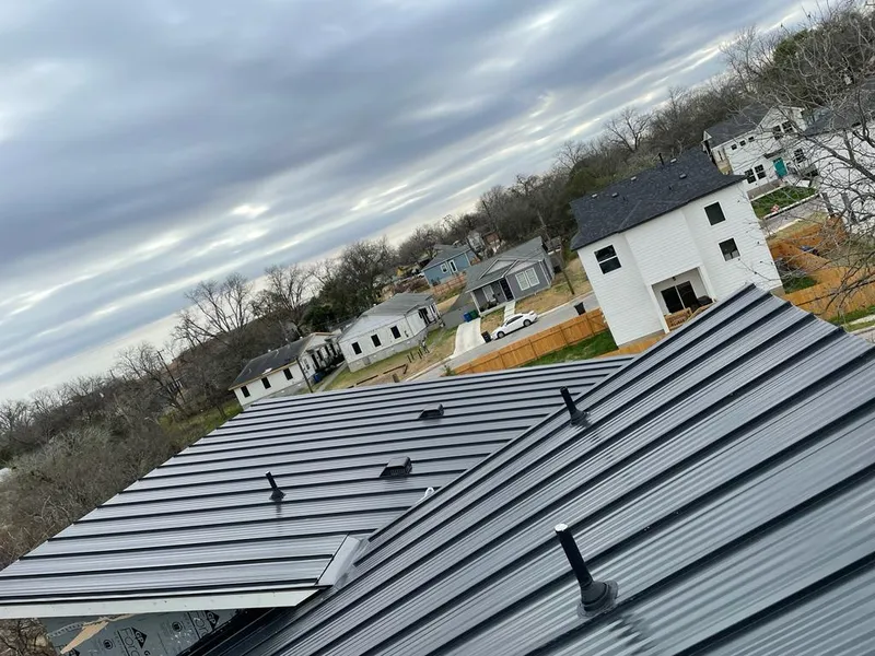 Standing seam metal roof panels with vents for Skylight Repair in Hutchison